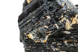 macro mineral stone sherle, schorl, black tourmaline on white background photo