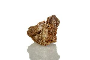 macro mineral stone Wulfenite on a white background photo
