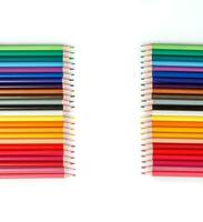 Multi-colored pencils in a row photo