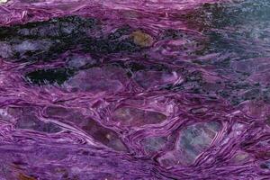 macro mineral stone Charoite on a white background photo