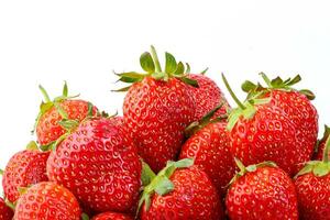 beautiful and ripe red strawberries on a white background photo