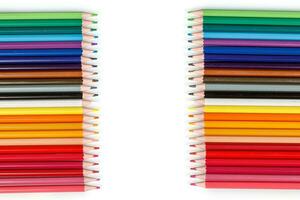 Multi-colored pencils in a row photo