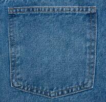 Back pocket of blue jeans photo