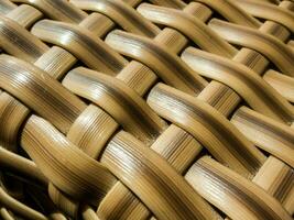 close up of a wicker chair with a woven pattern photo