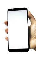 Man hand holding the smartphone with blank screen isolated on white background photo