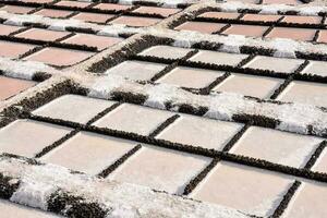 a close up of salt pans photo