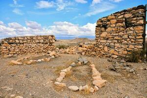 stone circles in a rocky desert photo