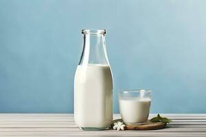 AI generated A bottle of milk and a glass of milk on a wooden table on a blue background. AI Generated photo
