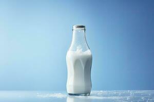 AI generated A glass bottle with full milk on blue background. photo