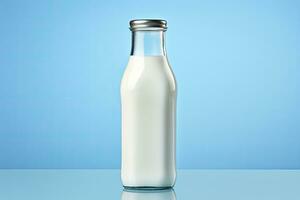 AI generated A glass bottle with full milk on blue background. photo