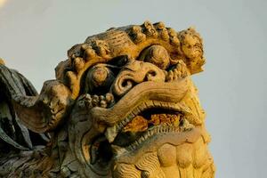 a close up of a chinese dragon statue photo