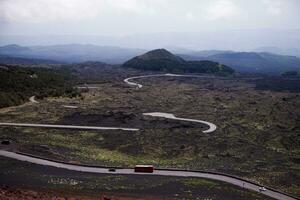 Etna national park panoramic view of volcanic landscape with crater, Catania, Sicily photo