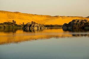 Nile the longest river in Africa. Primary water source of Egypt. Landscape with clear water river. photo