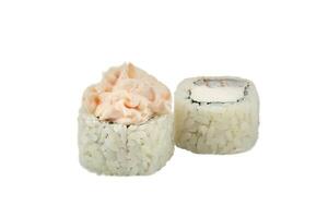 Sushi rolls with rice close-up on a white background. photo