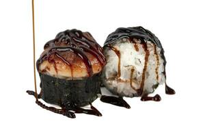Sushi isolated on white background. Baked sushi with soy sauce photo