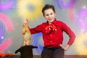 Colorful background of a magician boy worthy of a rabbit from a hat. photo