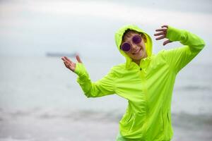 Happy boy enjoys run on beach. Amazed child face. Expressive emotional. Summer portrait of child excited run. photo