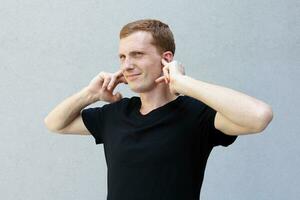 Close up portrait of a redhead of a beautiful manly guy with freckles photo