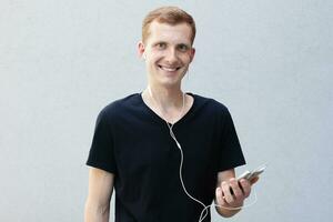 Close up portrait of a redhead of a beautiful manly guy with freckles photo