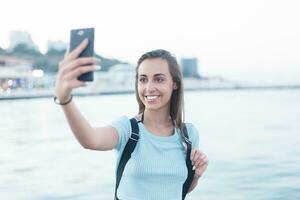 Portrait of attractive teenager girl standing photo