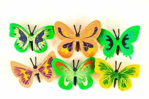 a group of colorful butterflies on a white background photo