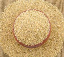 Raw Cereal Food Also Know as Bulgur, Dalia or Daliya. photo