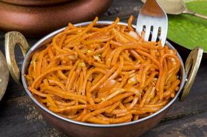 Spicy Fried Vegetable Veg Chow Mein on Wooden Table photo