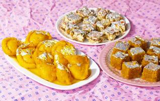 Indian Diwali Sweet Food Chandrakala with Sugar Free Dry Fruits, Mung Dal Chakki And Sweet Samosa photo