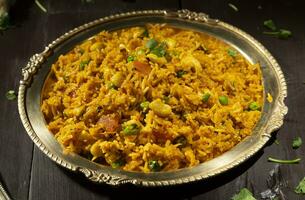 Indian Cuisine Food Kashmiri Pulao is A Delicious Rice Preparation Where Rice is Cooked in Milk and is Loaded With Dry Fruits And Vegetables photo