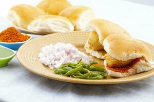 Indian Famous Street Food Vada Pav is a Vegetarian Fast Food Dish From Maharashtra photo