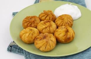 Fried Momos is a Traditional Dumpling Food From Nepal photo