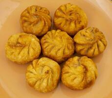 Fried Momos is a Traditional Dumpling Food From Nepal photo