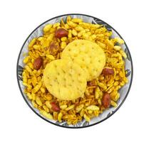 Indian Street Spicy Food Bhel puri is a savoury snack on white background photo