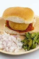 Indian Famous Street Food Vada Pav is a Vegetarian Fast Food Dish From Maharashtra photo