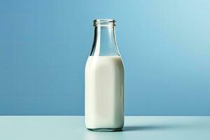 AI generated A glass bottle with full milk on blue background. AI Generated photo