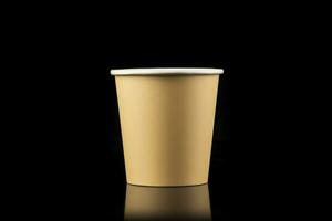 AI generated Side view yellow empty disposable paper fast food cup isolated on black background. Generative AI photo