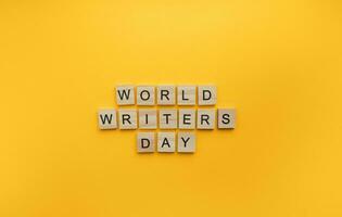 On March 3, World writers day, a minimalistic banner with an inscription in wooden letters photo