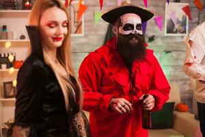 Man dressed up like an evil medieval pirate at halloween party. photo