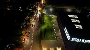 Aerial View of Illuminated Road and Traffic Roundabout at Barnfield College A6 East Luton City of England UK. The Footage Was Captured with Drone's Camera on November 11th, 2023 video