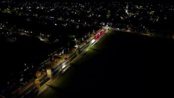 Aerial View of Illuminated Road and Traffic Roundabout at Barnfield College A6 East Luton City of England UK. The Footage Was Captured with Drone's Camera on November 11th, 2023 video