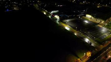 Aerial View of Illuminated Road and Traffic Roundabout at Barnfield College A6 East Luton City of England UK. The Footage Was Captured with Drone's Camera on November 11th, 2023 video