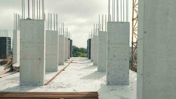 A view of the monolith structures at the construction site. Panorama of threshing towers video