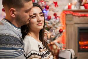 Croped shot of happy couple on christmas day. photo