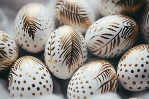 AI generated hand painted decorated Easter eggs pattern flat lay white and gold colors, modern photo