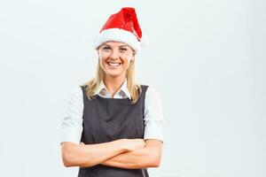 retrato de contento y contenido mujer de negocios con Papa Noel sombrero foto