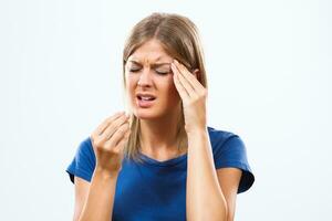 Woman taking pills for headache photo