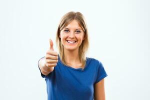 Woman showing thumbs up photo