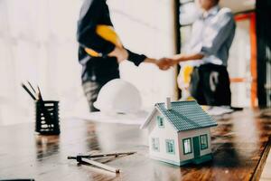 architect man working with laptop and blueprints,engineer inspection in workplace for architectural plan,sketching a construction project ,selective focus,Business concept vintage color photo
