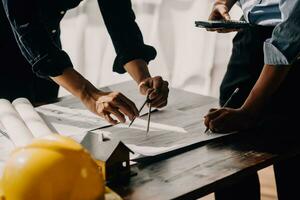 architect man working with laptop and blueprints,engineer inspection in workplace for architectural plan,sketching a construction project ,selective focus,Business concept vintage color photo