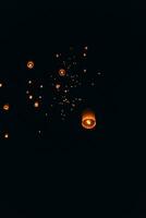 Floating lanterns at Yi Peng Festival in Chiang Mai photo